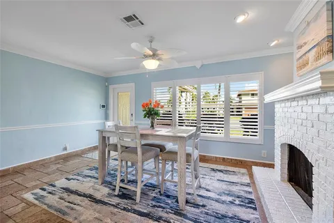 a view of a livingroom with furniture and a fireplace