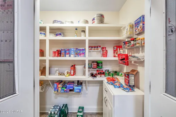 a room with storage and utility