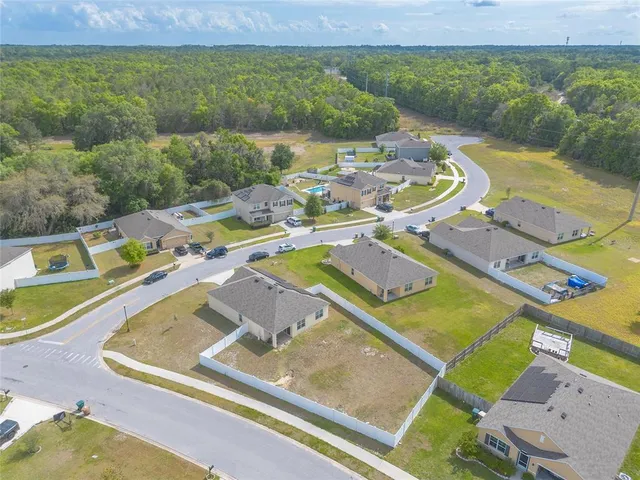 a view of a swimming pool with an ocean view