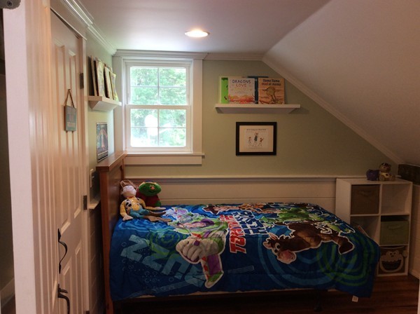 840 W Road New Braintree, MA 01531 - Photo 22 of 30 a bed sitting in a bedroom next to a window
