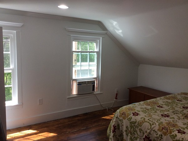 840 W Road New Braintree, MA 01531 - Photo 23 of 30 a bedroom with a bed and a window