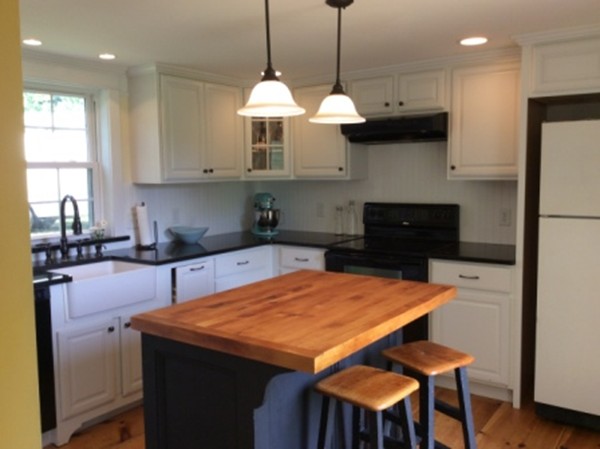 840 W Road New Braintree, MA 01531 - Photo 8 of 30 a kitchen with stainless steel appliances granite countertop a sink a stove a refrigerator and island