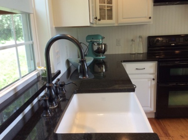 840 W Road New Braintree, MA 01531 - Photo 9 of 30 a close view of sink and washing machine
