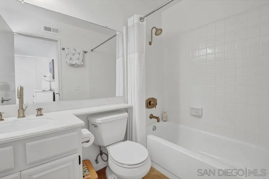 1758 Edgefield Lane Encinitas, CA 92024 - Photo 15 of 25 a bathroom with a sink a toilet and a bathtub