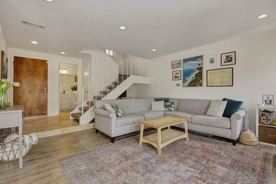 1758 Edgefield Lane Encinitas, CA 92024 - Photo 2 of 25 a living room with furniture and a wooden floor