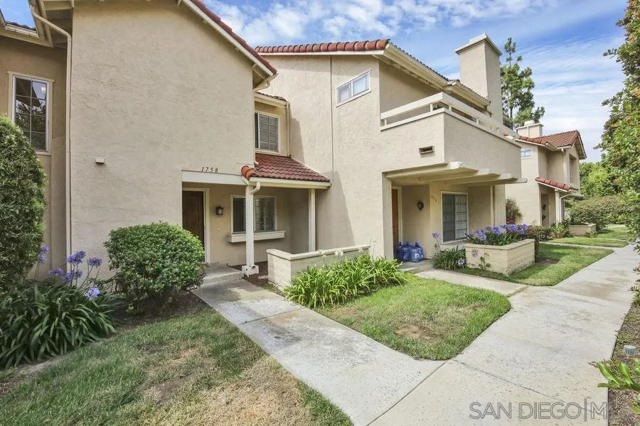 1758 Edgefield Lane Encinitas, CA 92024 - Photo 24 of 25 front view of a house with a yard