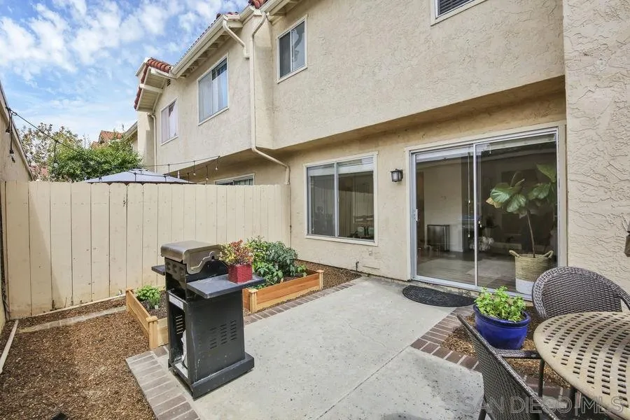 1758 Edgefield Lane Encinitas, CA 92024 - Photo 10 of 25 a backyard of a house with outdoor seating