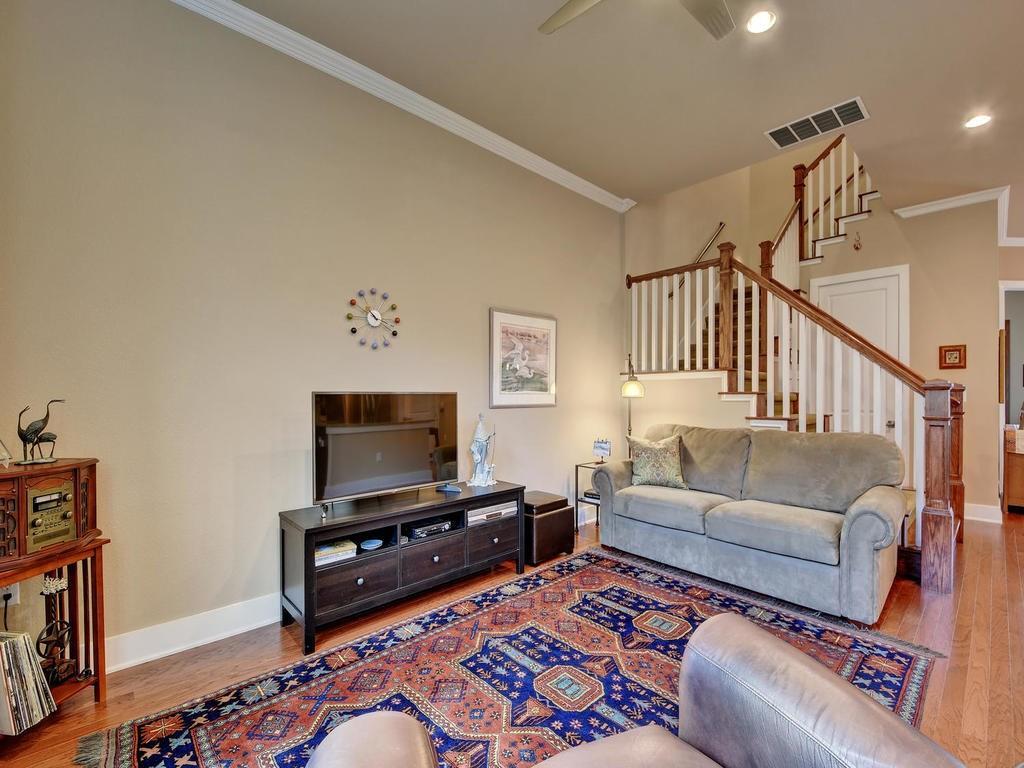 4545 Mattie Street Austin, TX 78723 - Photo 12 of 28 a living room with furniture and a flat screen tv