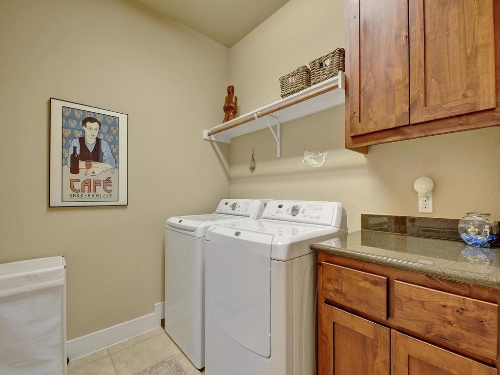 4545 Mattie Street Austin, TX 78723 - Photo 23 of 28 a utility room with dryer and washer