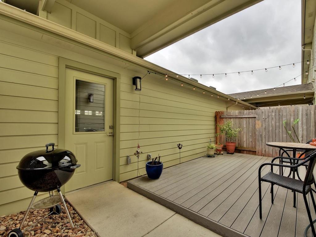 4545 Mattie Street Austin, TX 78723 - Photo 26 of 28 a view of a backyard with furniture and a grill