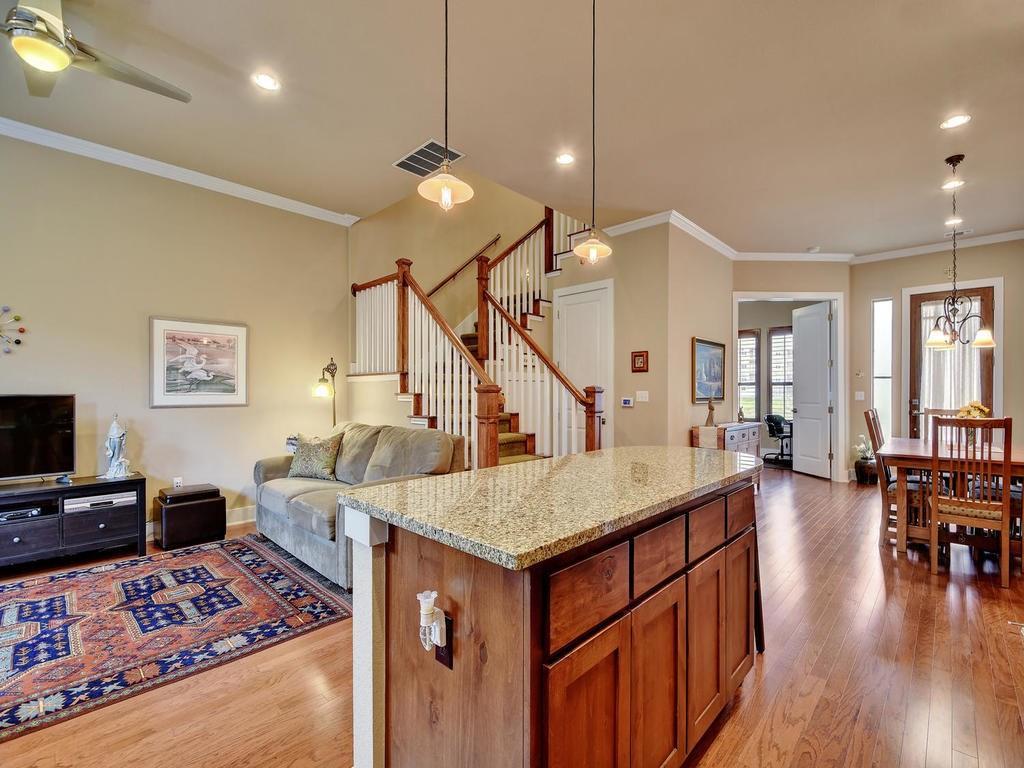 4545 Mattie Street Austin, TX 78723 - Photo 28 of 28 a view of a livingroom with furniture wooden floor and a rug