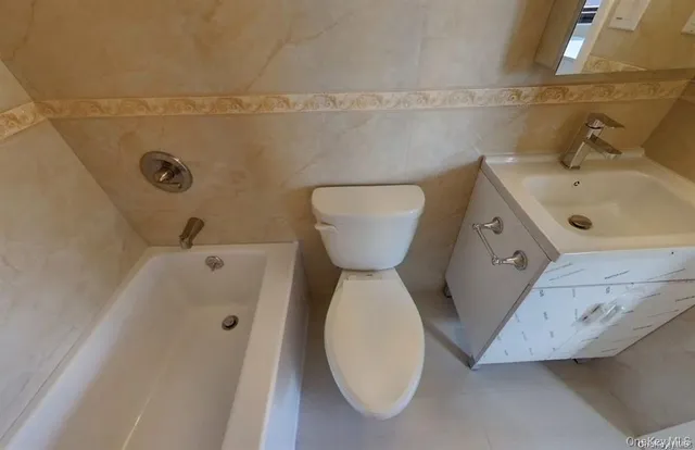 a bathroom with a sink and toilet