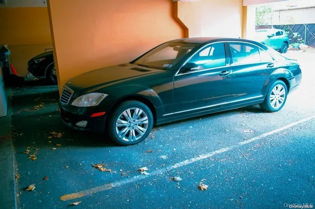 a car parked in front of a house