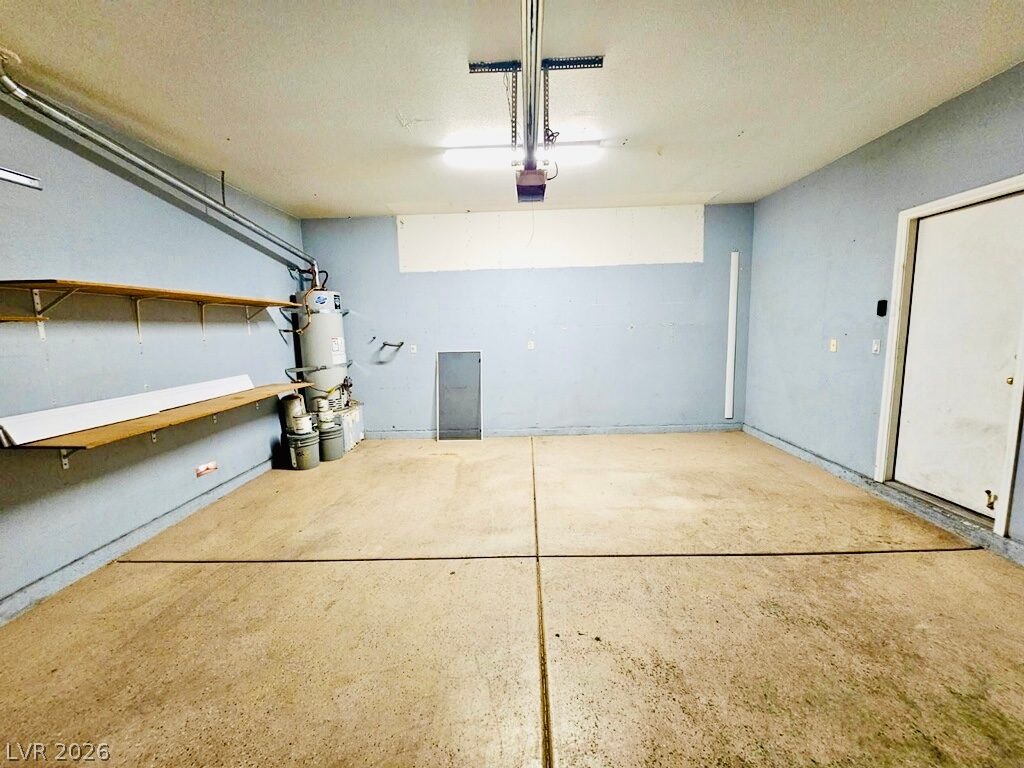 5953 Crumbling Ridge Street Henderson, NV 89011 - Photo 39 of 42 Secure parking and ample storage solutions for tools and equipment.