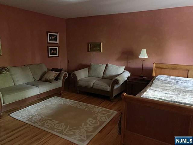 126 Hawthorne Avenue Park Ridge, NJ 07656 - Photo 12 of 22 a living room with furniture and a couch