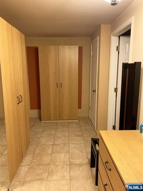 126 Hawthorne Avenue Park Ridge, NJ 07656 - Photo 14 of 22 a view of a kitchen with furniture and an entryway