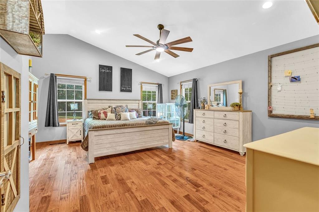 340 Tom Bell Road Milner, GA 30257 - Photo 20 of 34 a living room with furniture and windows