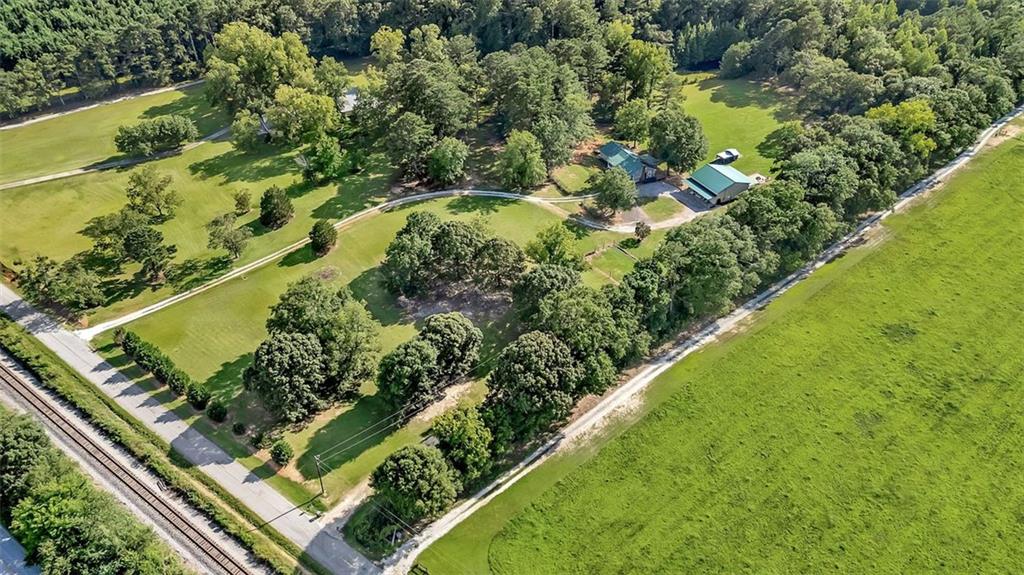 340 Tom Bell Road Milner, GA 30257 - Photo 31 of 34 a view of a garden