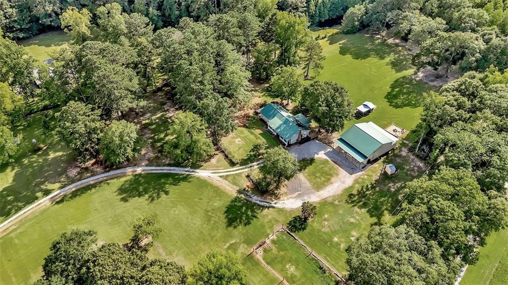 340 Tom Bell Road Milner, GA 30257 - Photo 32 of 34 a view of a swimming pool