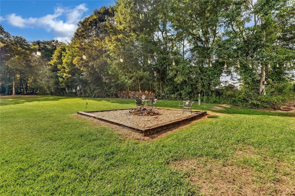 340 Tom Bell Road Milner, GA 30257 - Photo 8 of 34 a view of a basketball court