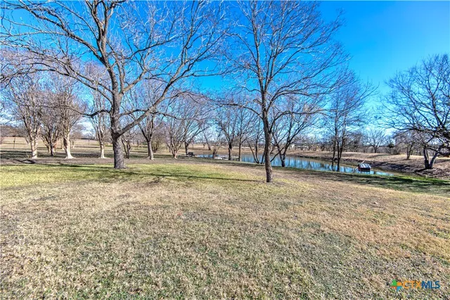 a view of road with trees