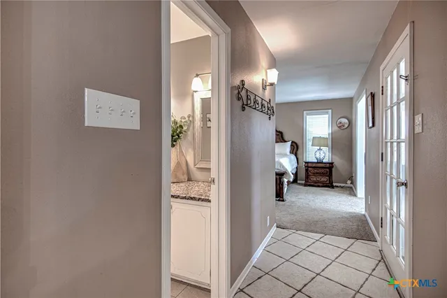 a view of a livingroom with furniture and entryway