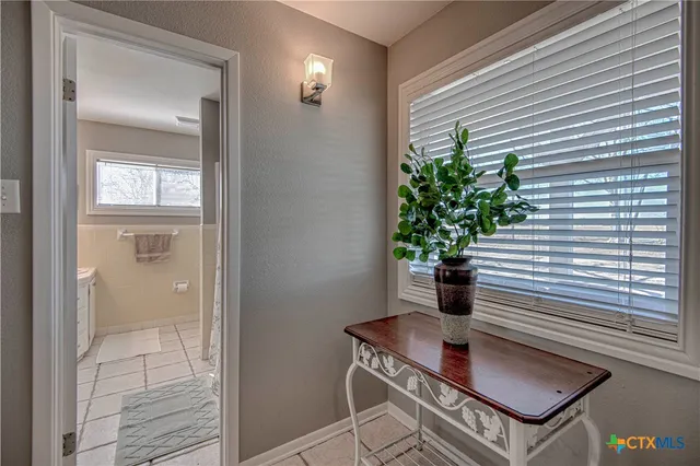 a view of a workspace with furniture