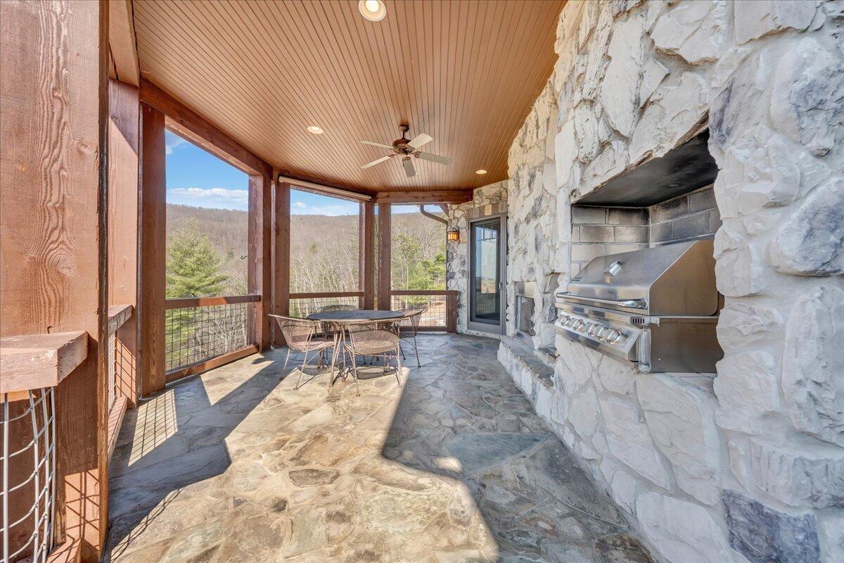 144 Seven Ridges Road Hot Springs, VA 24445 - Photo 36 of 99 39 Built-In Grill and Firplace (Wood or