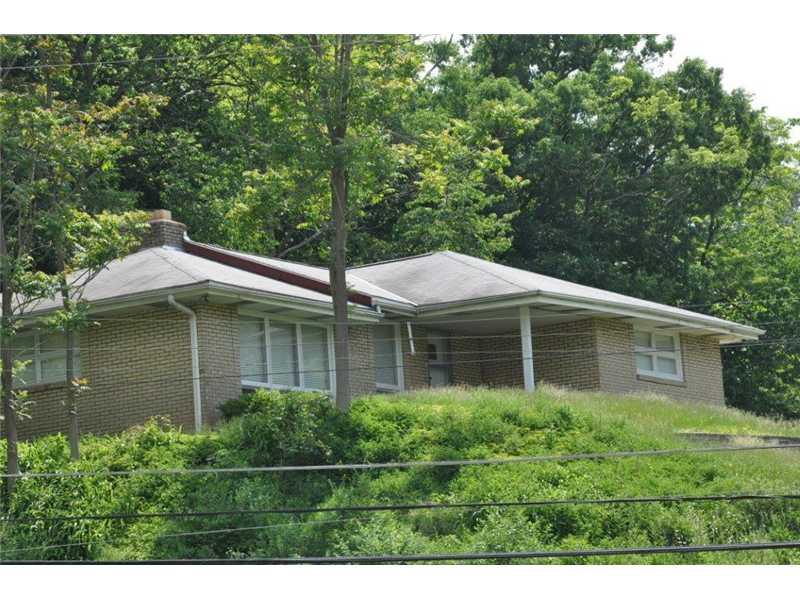 105 Oakhurst Road Pittsburgh, PA 15215 - Photo 1 of 12 Exterior Front. This is a level corner lot with lo9ts of privacy
