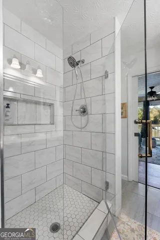 a kitchen with a stove and a refrigerator