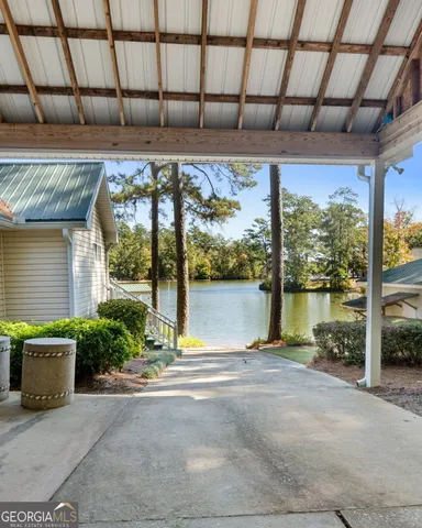 a view of a swimming pool with a lounge chair