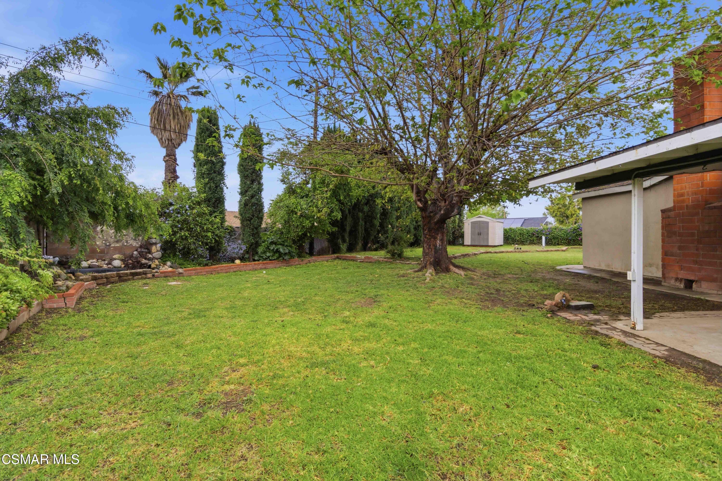 2077 Sebring Court Simi Valley, CA 93065 - Photo 15 of 20 a backyard of a house with lots of green space