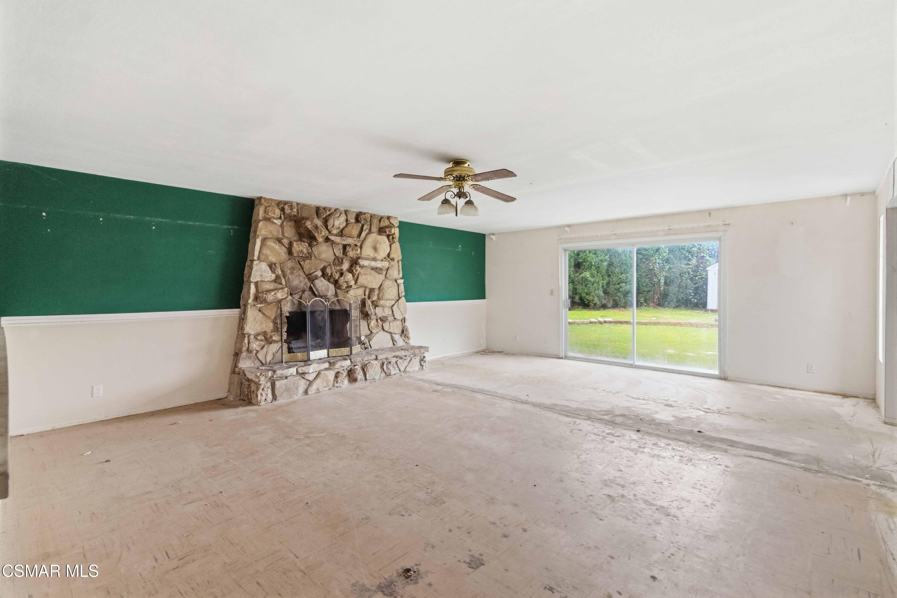 2077 Sebring Court Simi Valley, CA 93065 - Photo 4 of 20 a view of a livingroom with furniture and a fireplace