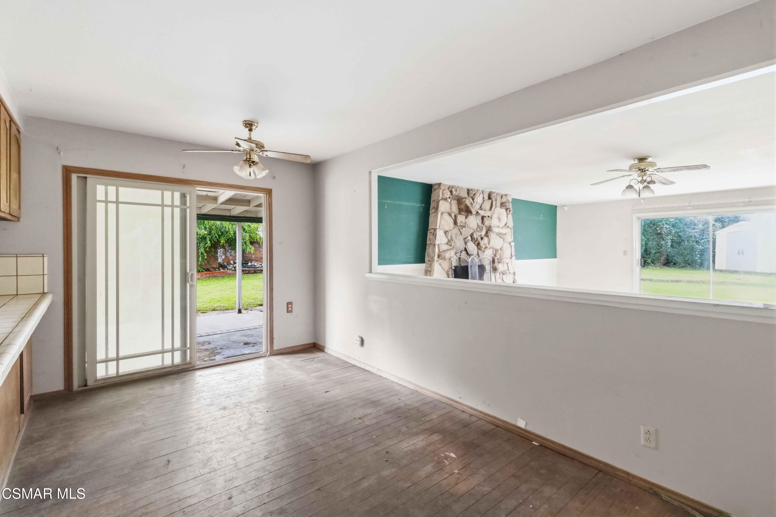2077 Sebring Court Simi Valley, CA 93065 - Photo 7 of 20 wooden floor in an empty room with a window