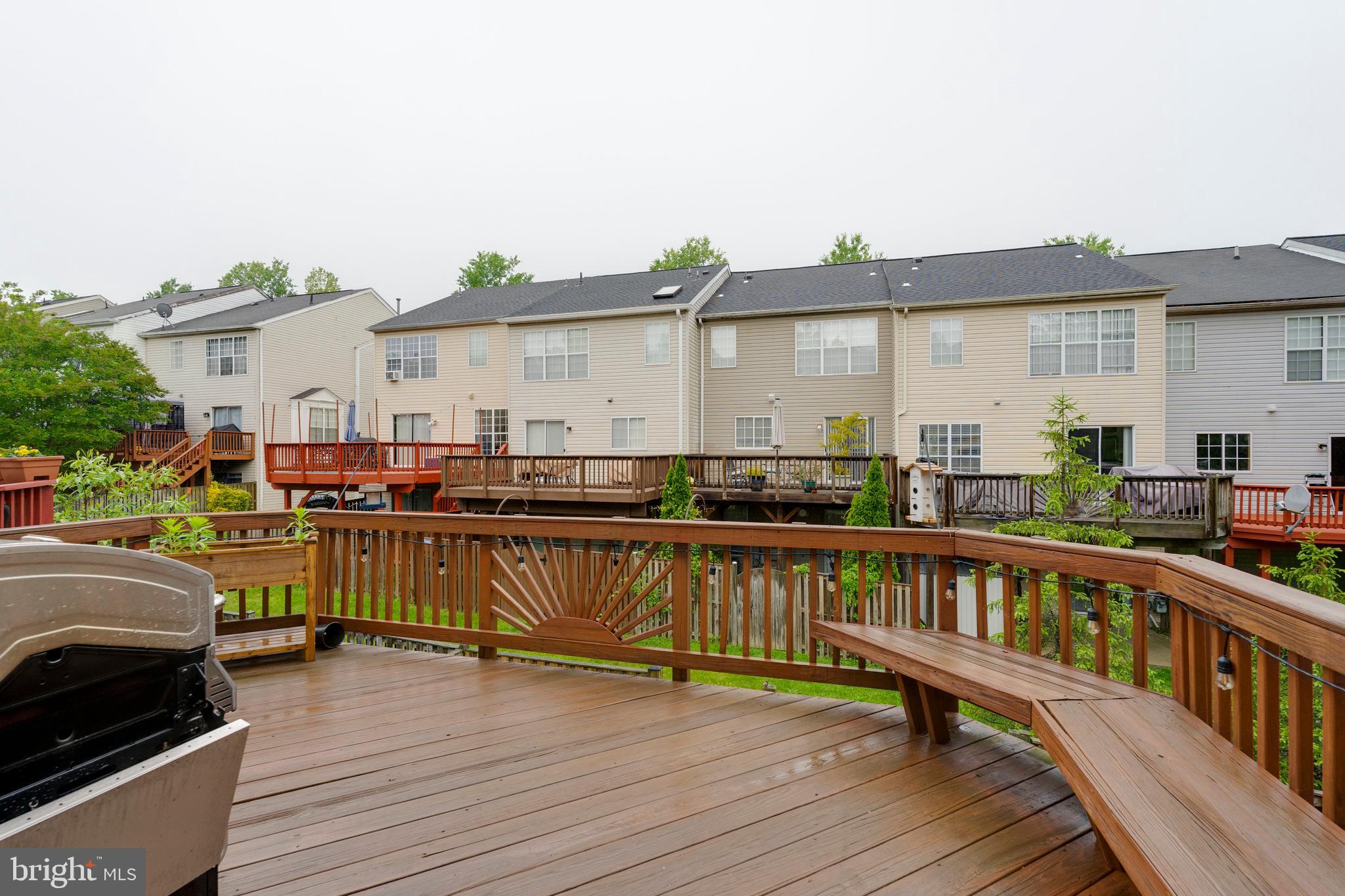 2303 Massanutten Drive Silver Spring, MD 20906 - Photo 23 of 24 a view of a house with wooden deck and furniture