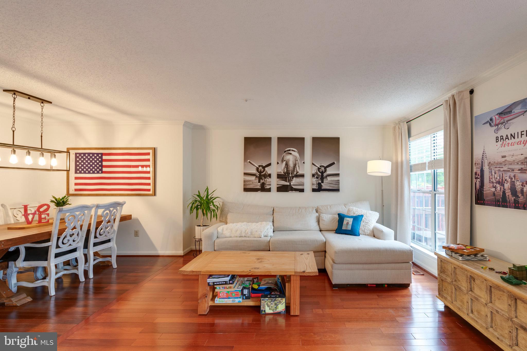 2303 Massanutten Drive Silver Spring, MD 20906 - Photo 8 of 24 a living room with furniture and a wooden floor
