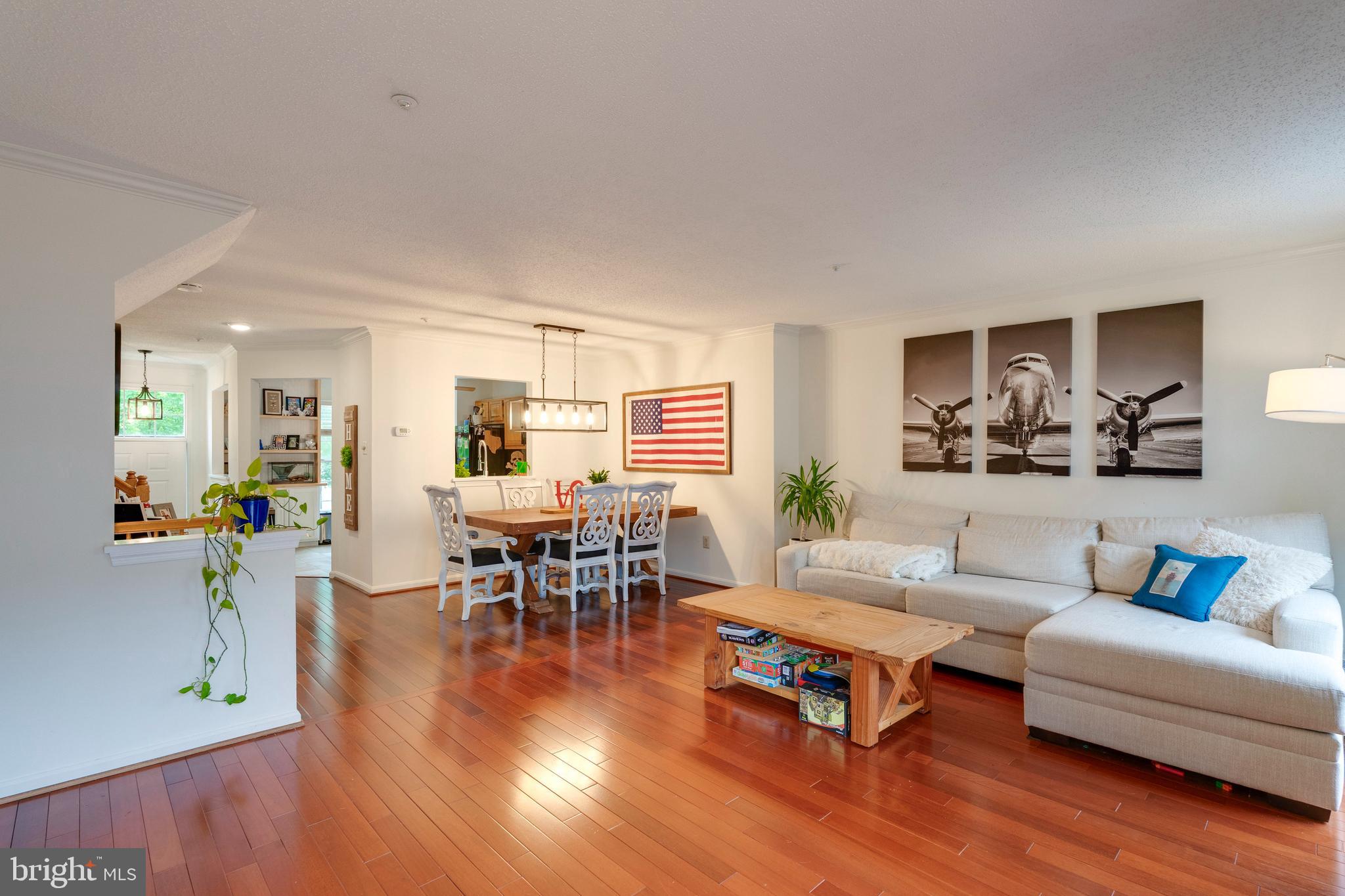 2303 Massanutten Drive Silver Spring, MD 20906 - Photo 9 of 24 a living room with furniture and wooden floor