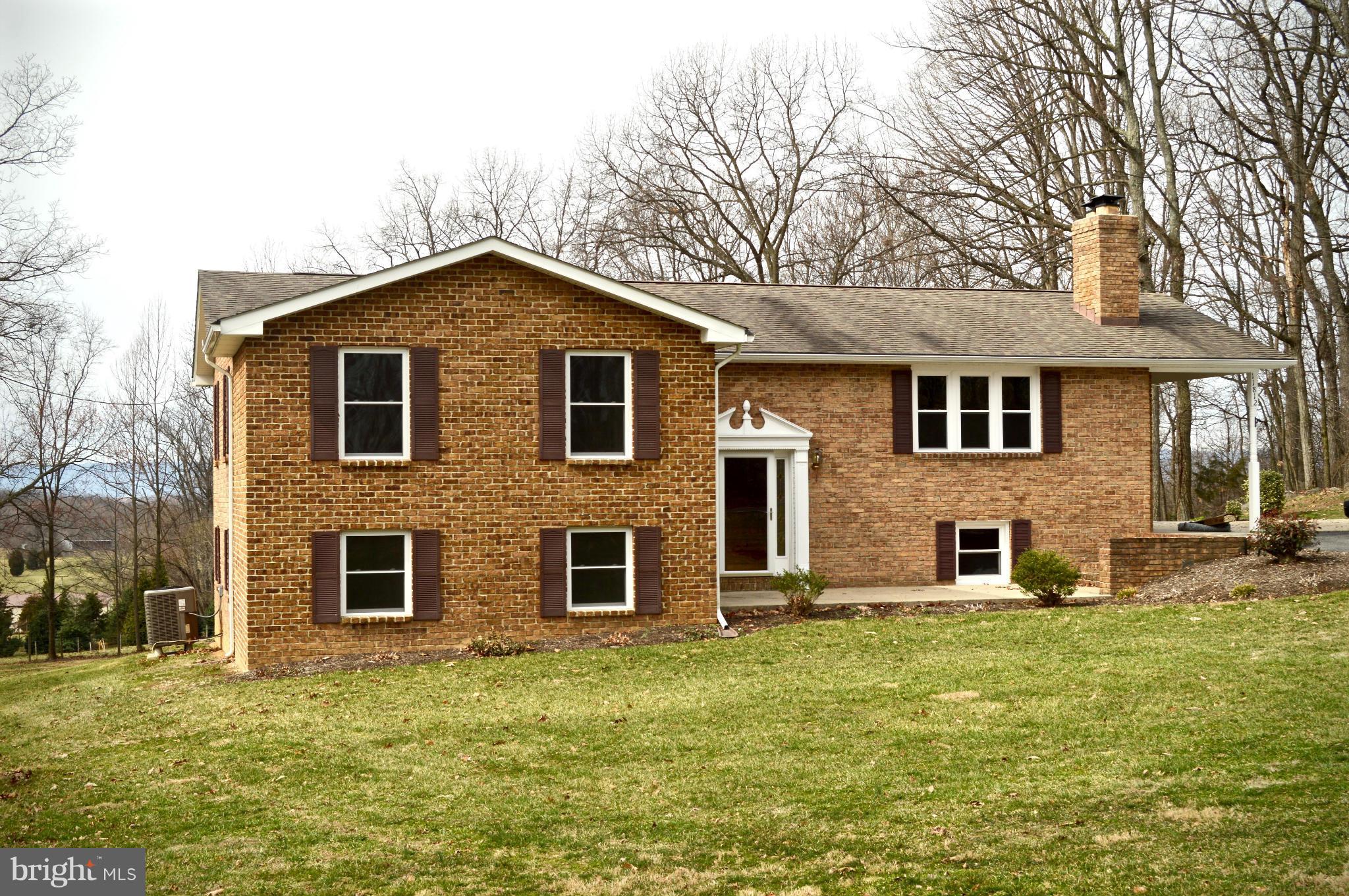 11812 Warner Road Keymar, MD 21757 - Photo 2 of 25 a front view of a house with a yard