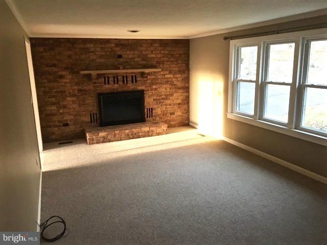 11812 Warner Road Keymar, MD 21757 - Photo 15 of 25 a view of empty room with a fireplace