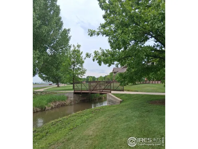 a view of a lake with a big yard