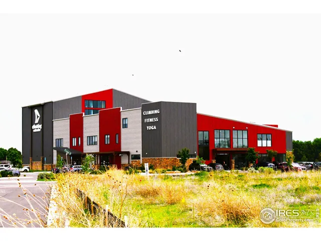 a view of a golf course with chairs