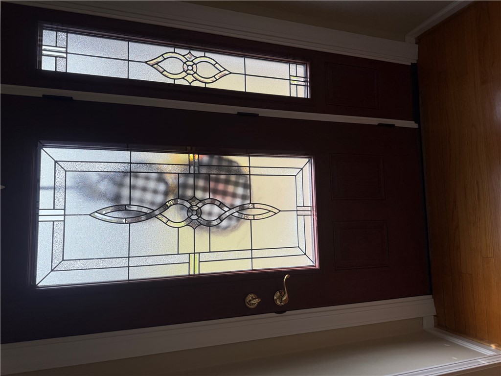 121 Nautical Way Anderson, SC 29625 - Photo 12 of 37 Ornate stained glass accents elevate the entry, offering both privacy and visual allure.