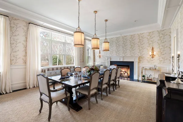 a dining room with furniture window chairs