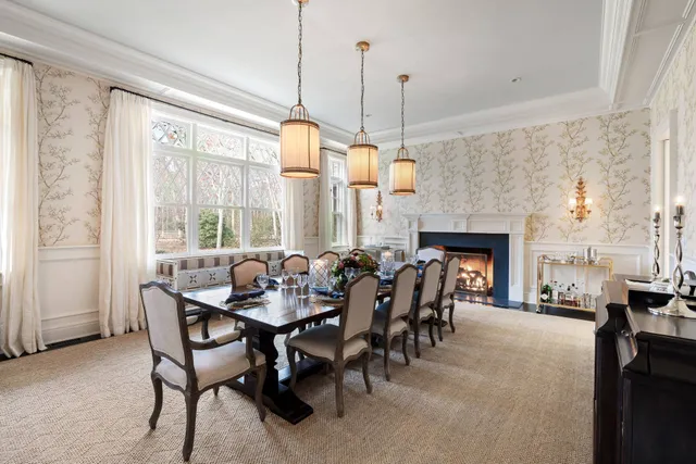 a dining room with furniture window chairs
