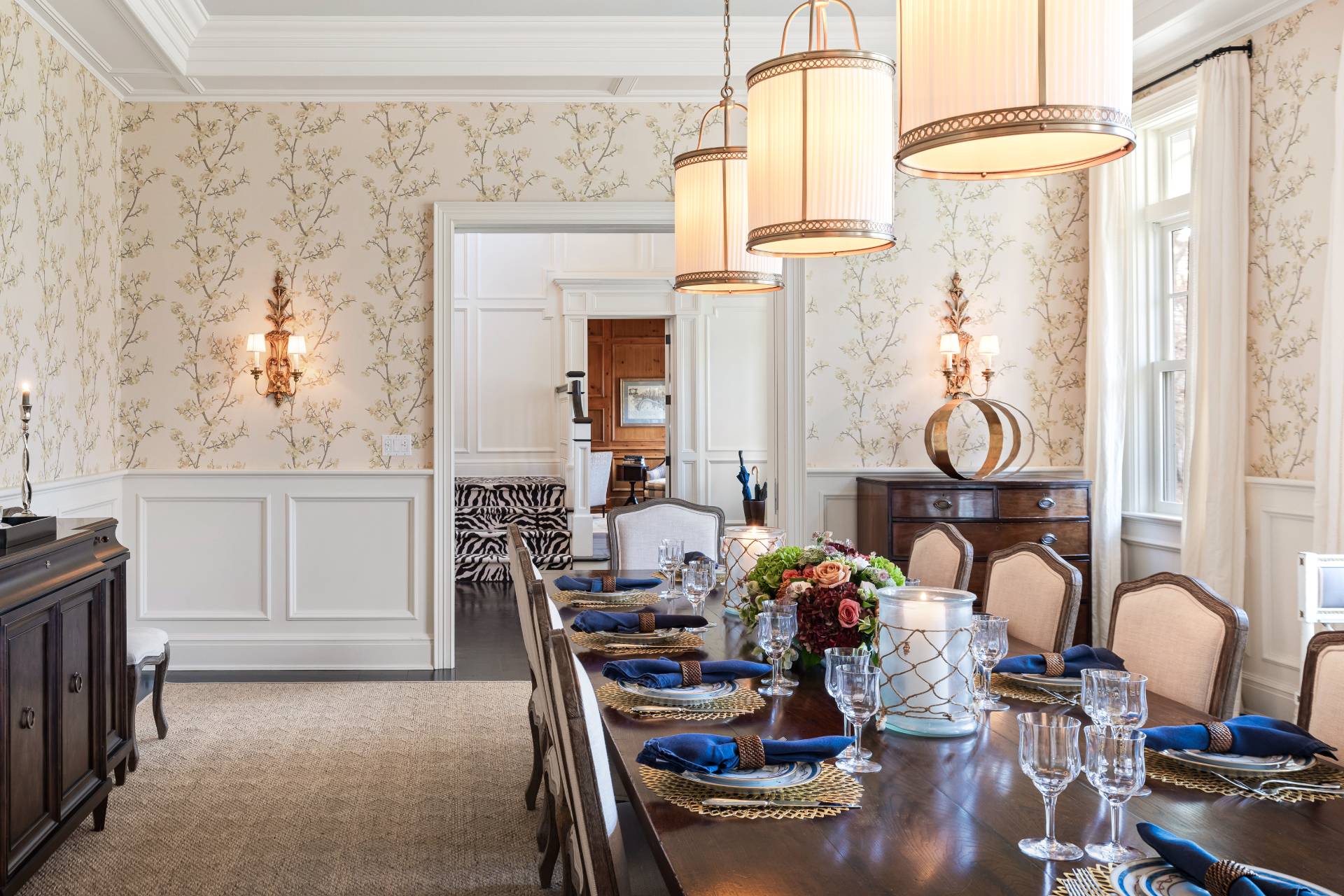 58 Wainscott Stone Road Wainscott, NY 11975 - Photo 15 of 48 a view of a dining room with furniture and chandelier