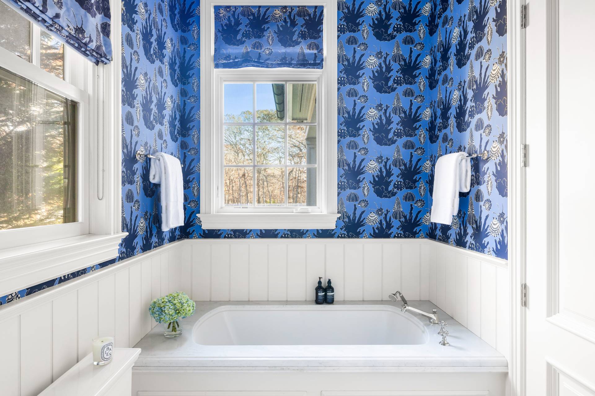 58 Wainscott Stone Road Wainscott, NY 11975 - Photo 25 of 48 a bath tub sitting in a bathroom next to a window