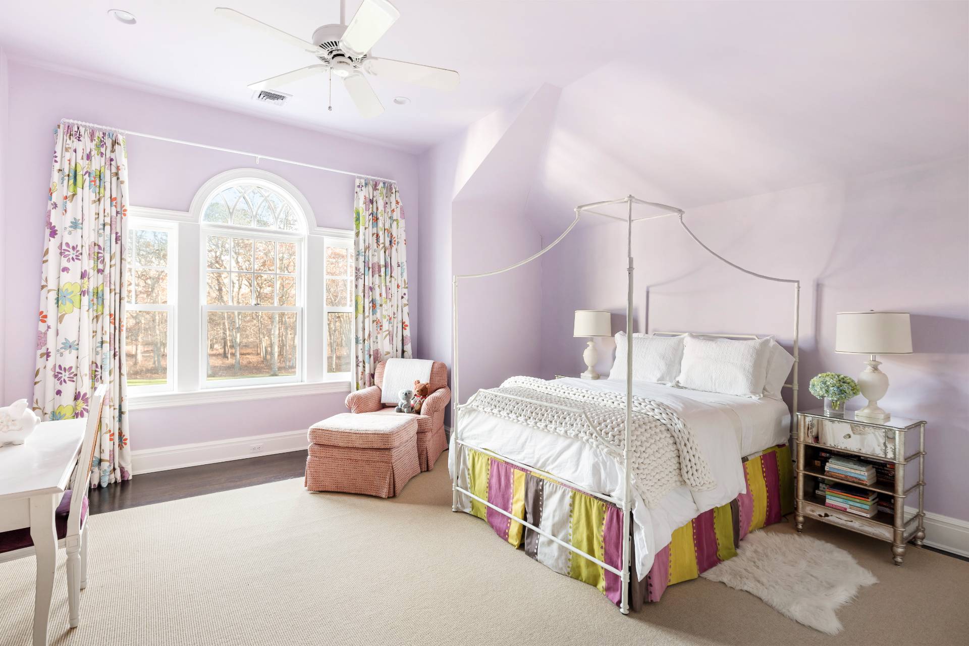 58 Wainscott Stone Road Wainscott, NY 11975 - Photo 31 of 48 a bedroom with a bed and a chandelier