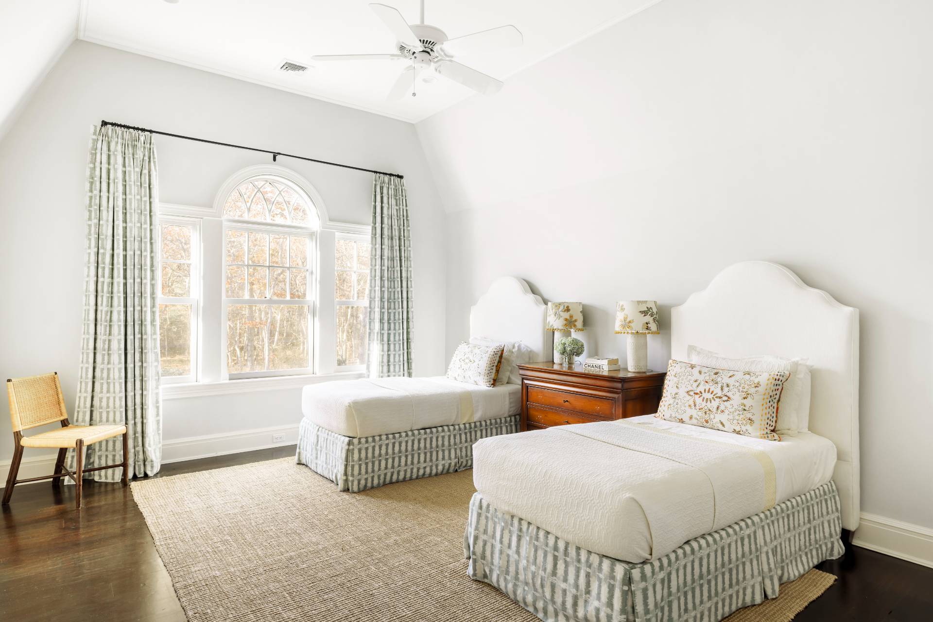 58 Wainscott Stone Road Wainscott, NY 11975 - Photo 36 of 48 a bedroom with a bed and a mirror