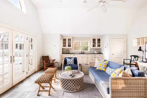a living room with furniture and a couch