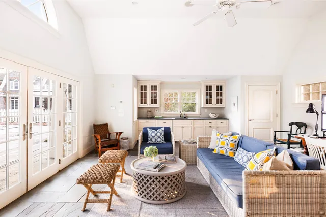 a living room with furniture and a couch